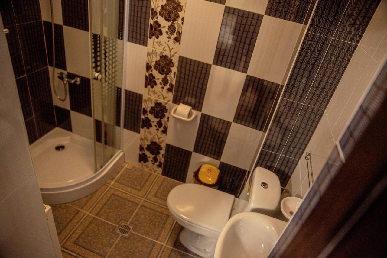 Отель Casa Robi Pestisani Экстерьер фото